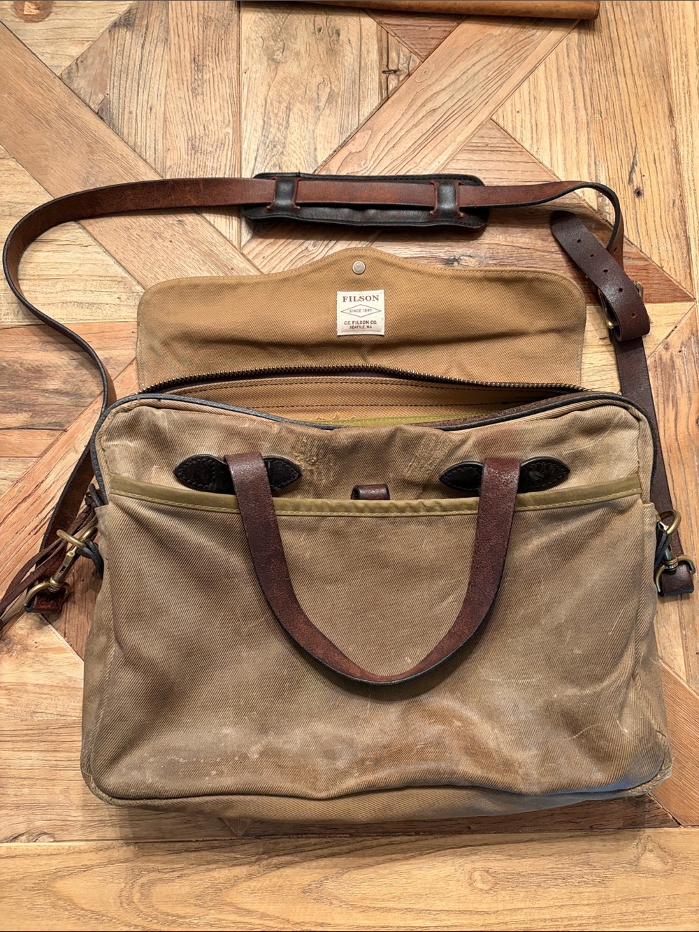 Filson original briefcase-rich patina and repairs from Filson Restoration Dept